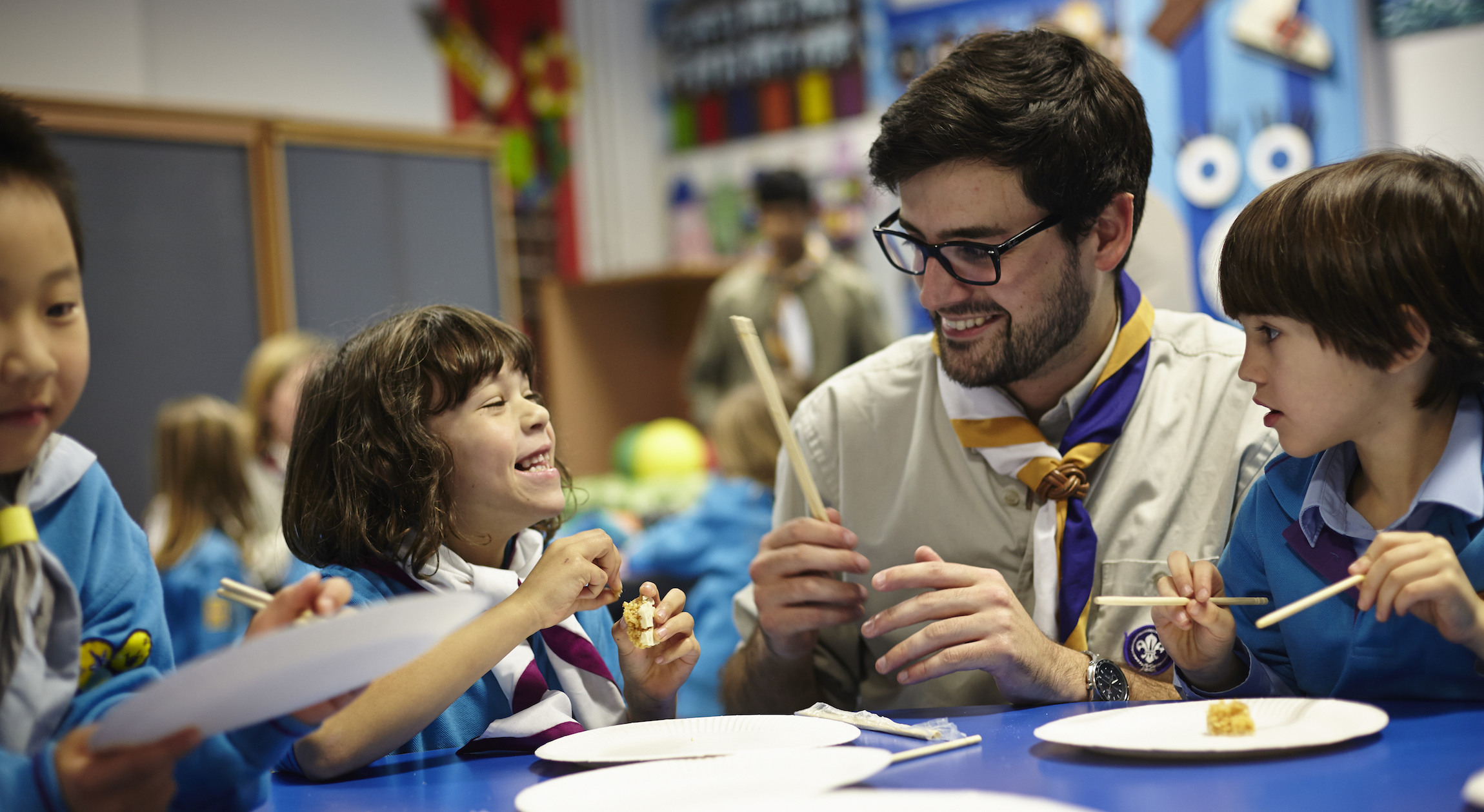 male leader working with beavers